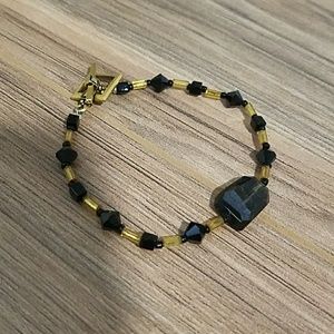 Black and gold bracelet